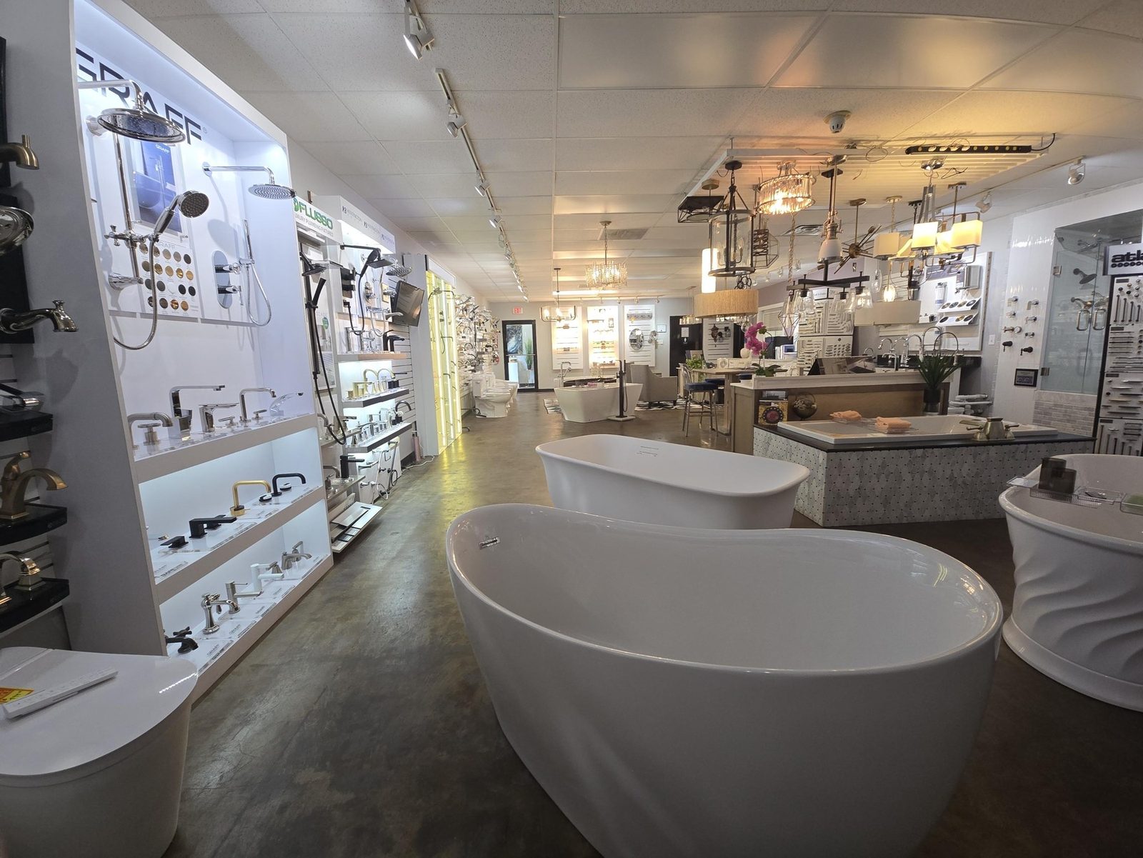 Live faucet and fixture displays in the showroom