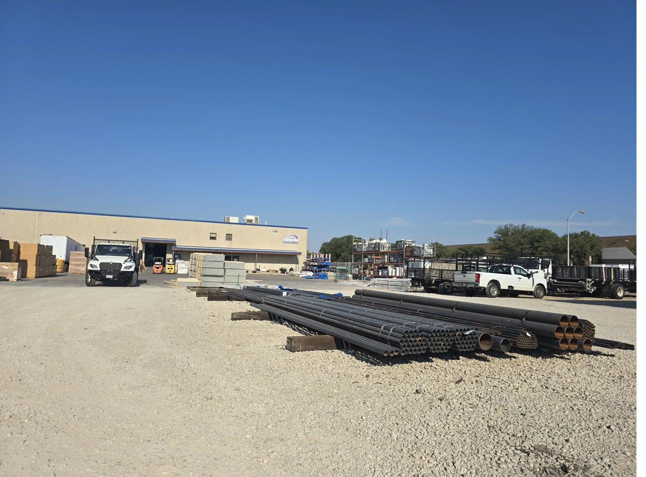 Our Carrollton branch, loading dock and yard with delivery trucks staged